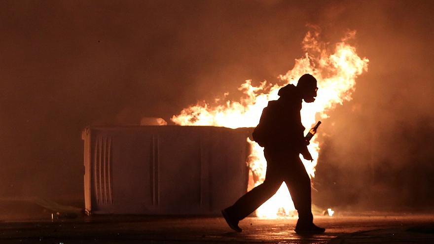 Clashes in Athens as protesters mark anniversary of teen shooting