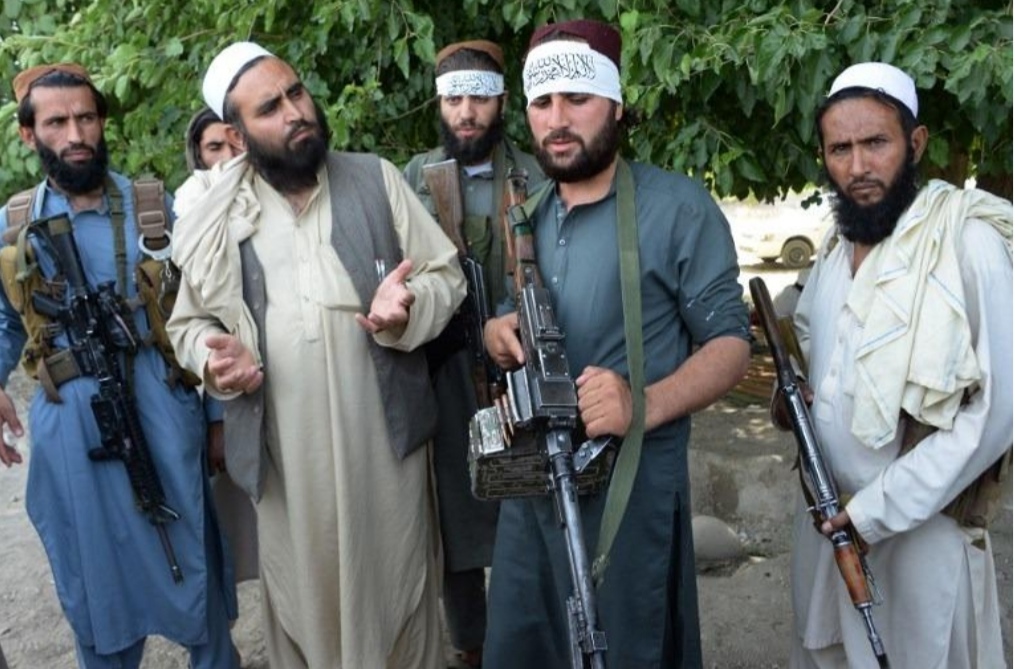 Taliban target Afghan military base, police center, killing 12