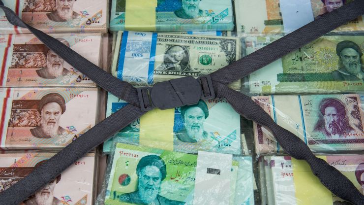 Iran looks to slash four zeroes from its spiraling currency