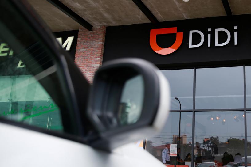 Didi shares pare off initial double-digit gains in IPO